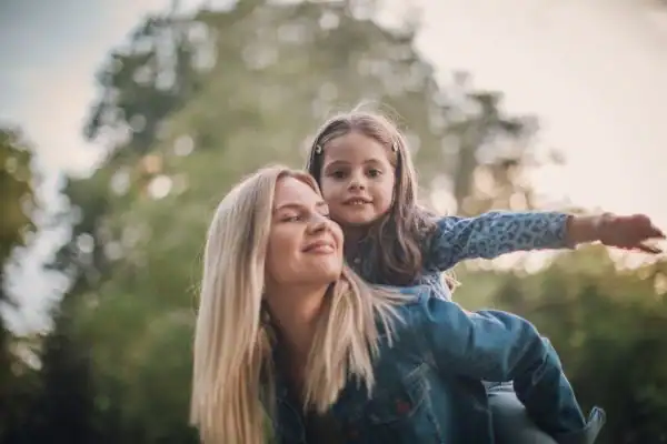 happy mum and daughter following mediation to resolve parental alienation Richmond upon Thames